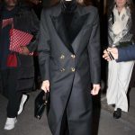 Nina Dobrev in a Black Coat Arrives at the Hotel Costes in Paris 03/04/2024