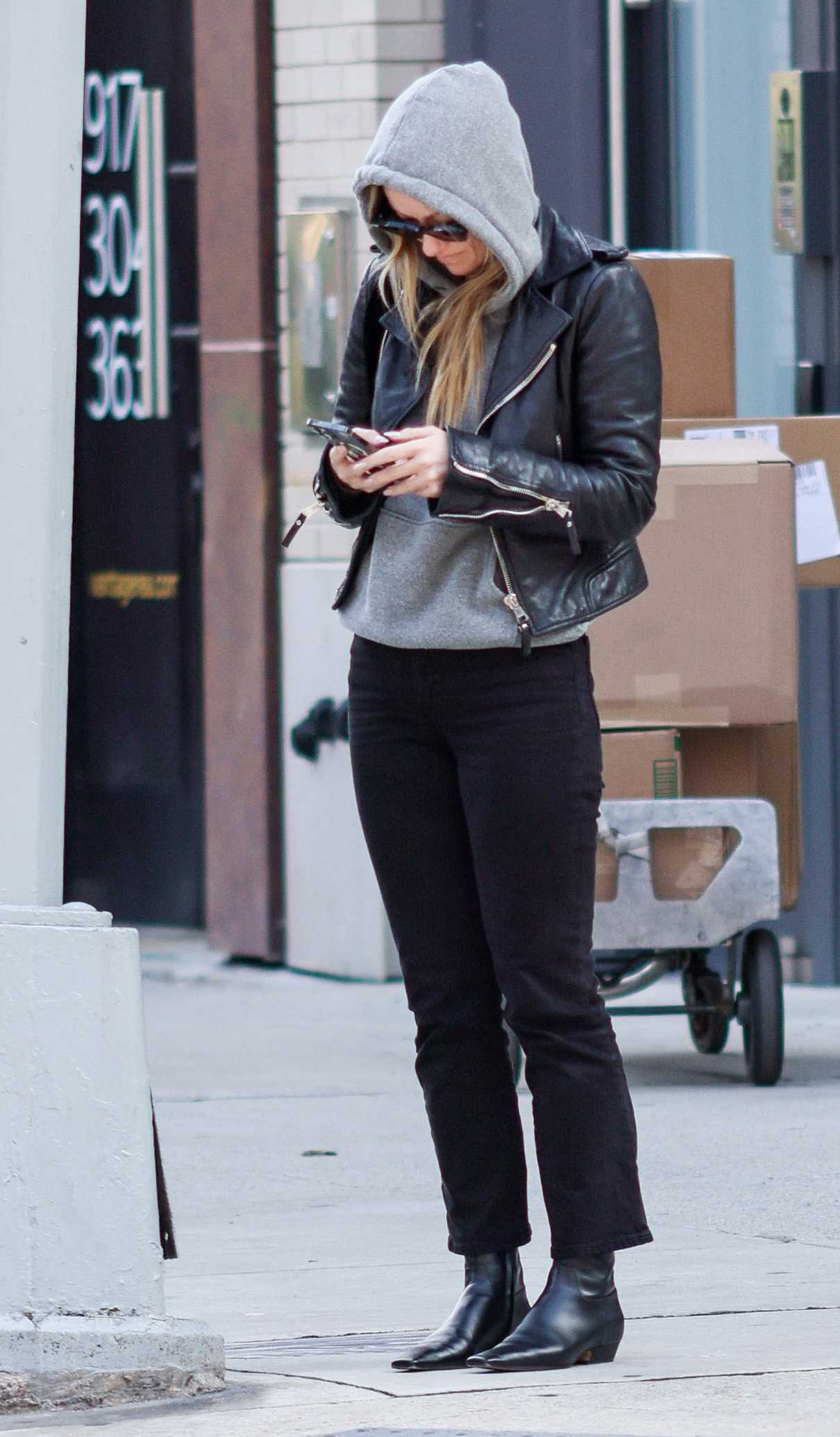 Olivia Wilde in a Black Leather Jacket