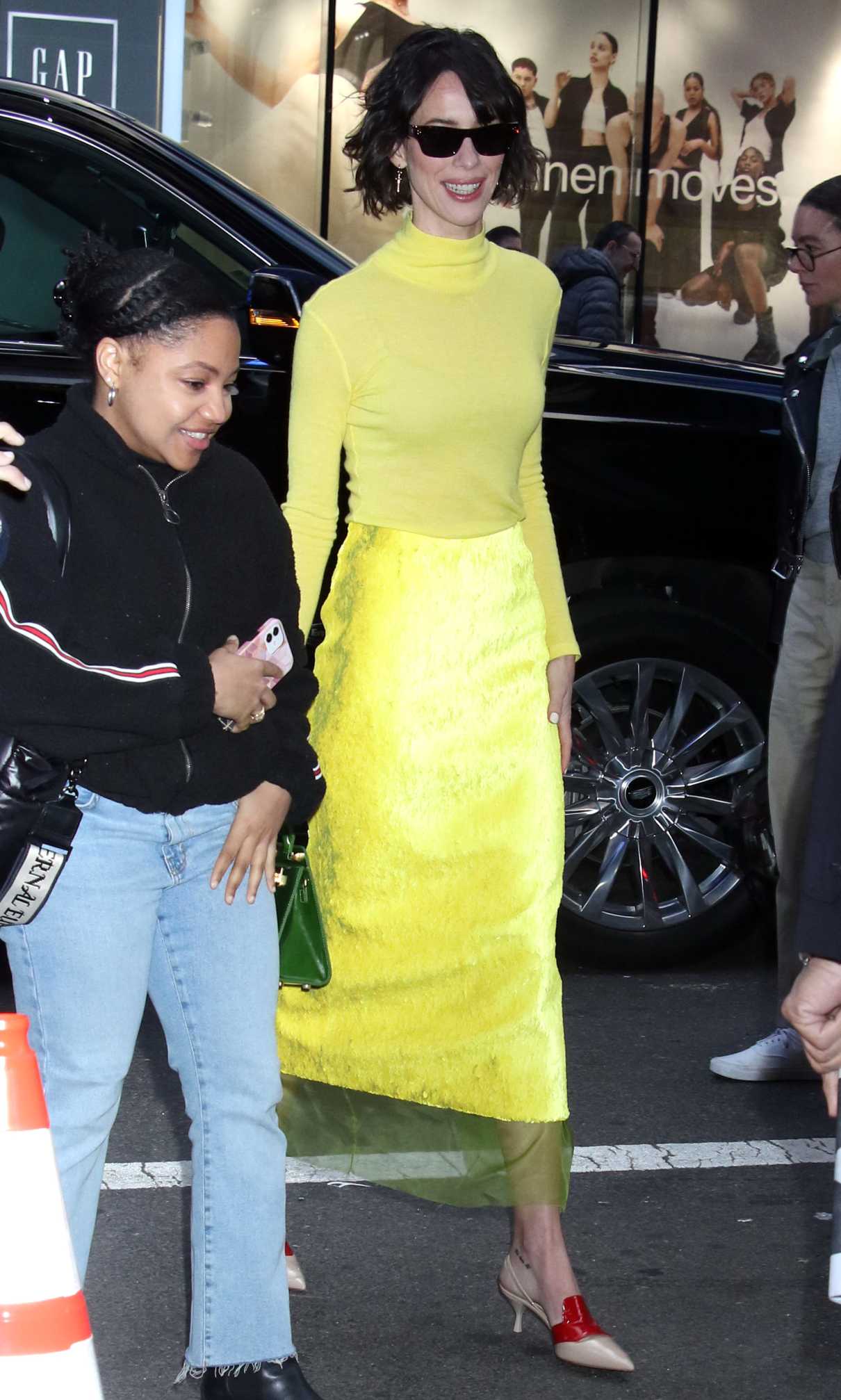 Rebecca Hall in a Yellow Ensemble