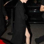 Zoey Deutch in a Black Coat Arrives at a Hotel in Paris 03/04/2024