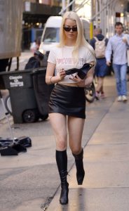 Anya Taylor-Joy in a Black Leather Mini Skirt