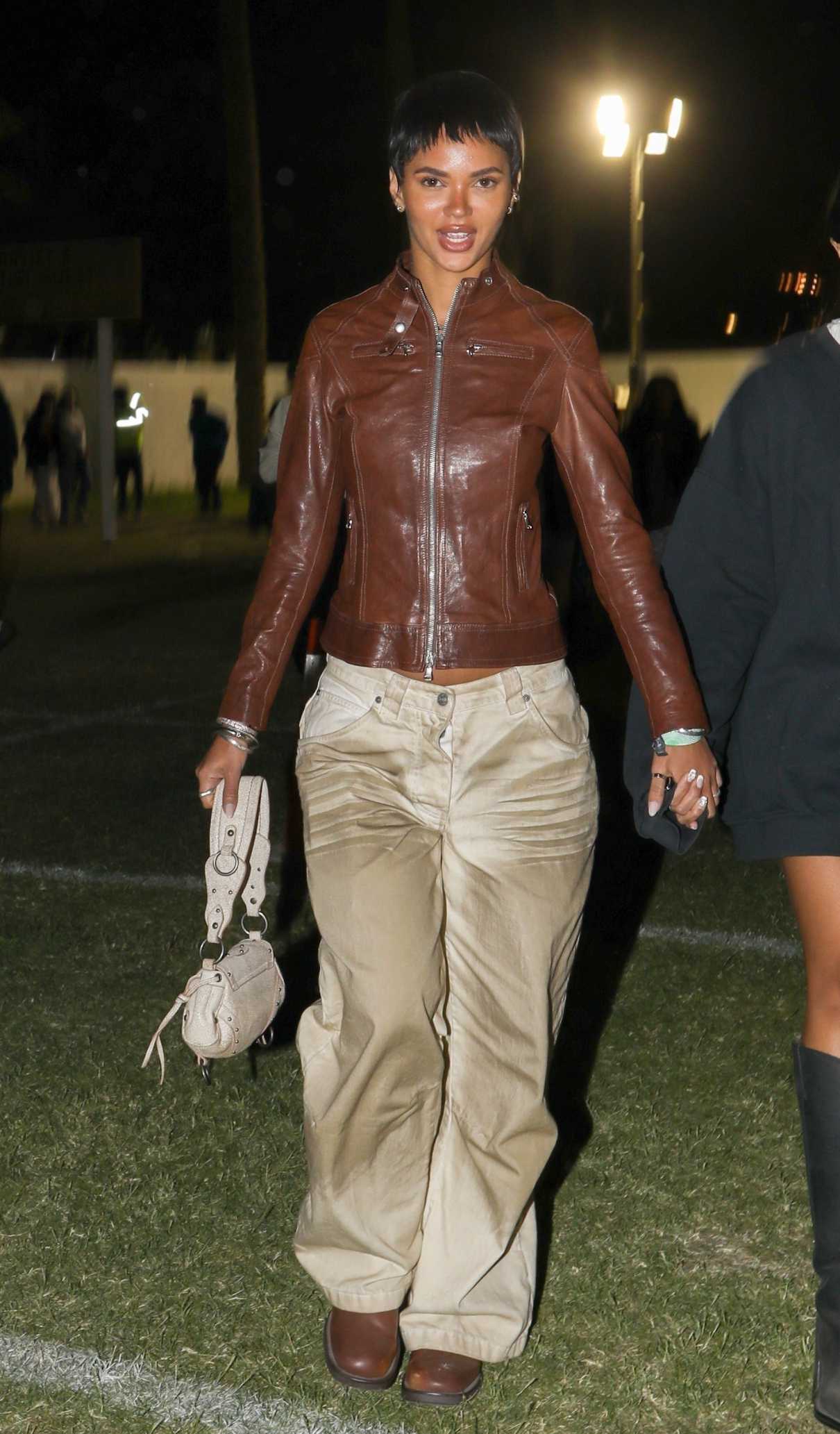 Juliana Nalu in a Brown Leather Jacket