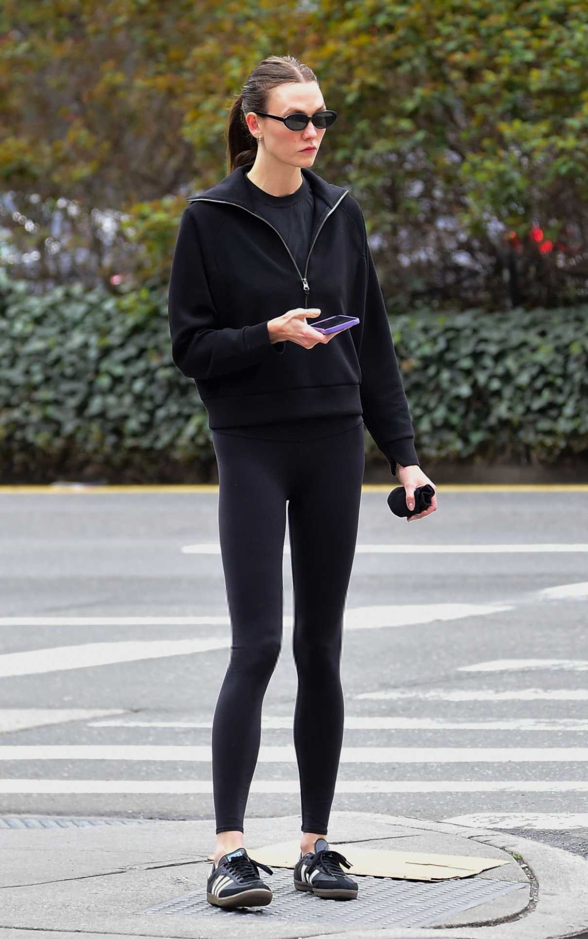 Karlie Kloss in a Black Sneakers