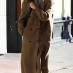 Katie Holmes in a Caramel Coloured Coat Was Seen on a Stroll in Manhattan’s SoHo Area in New York 04/07/2024