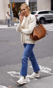 Kelly Rutherford in a Beige Cardigan