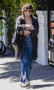 Milla Jovovich in a Blue Jeans