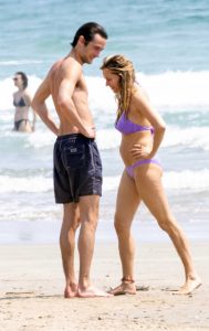 Sienna Miller in a Purple Bikini