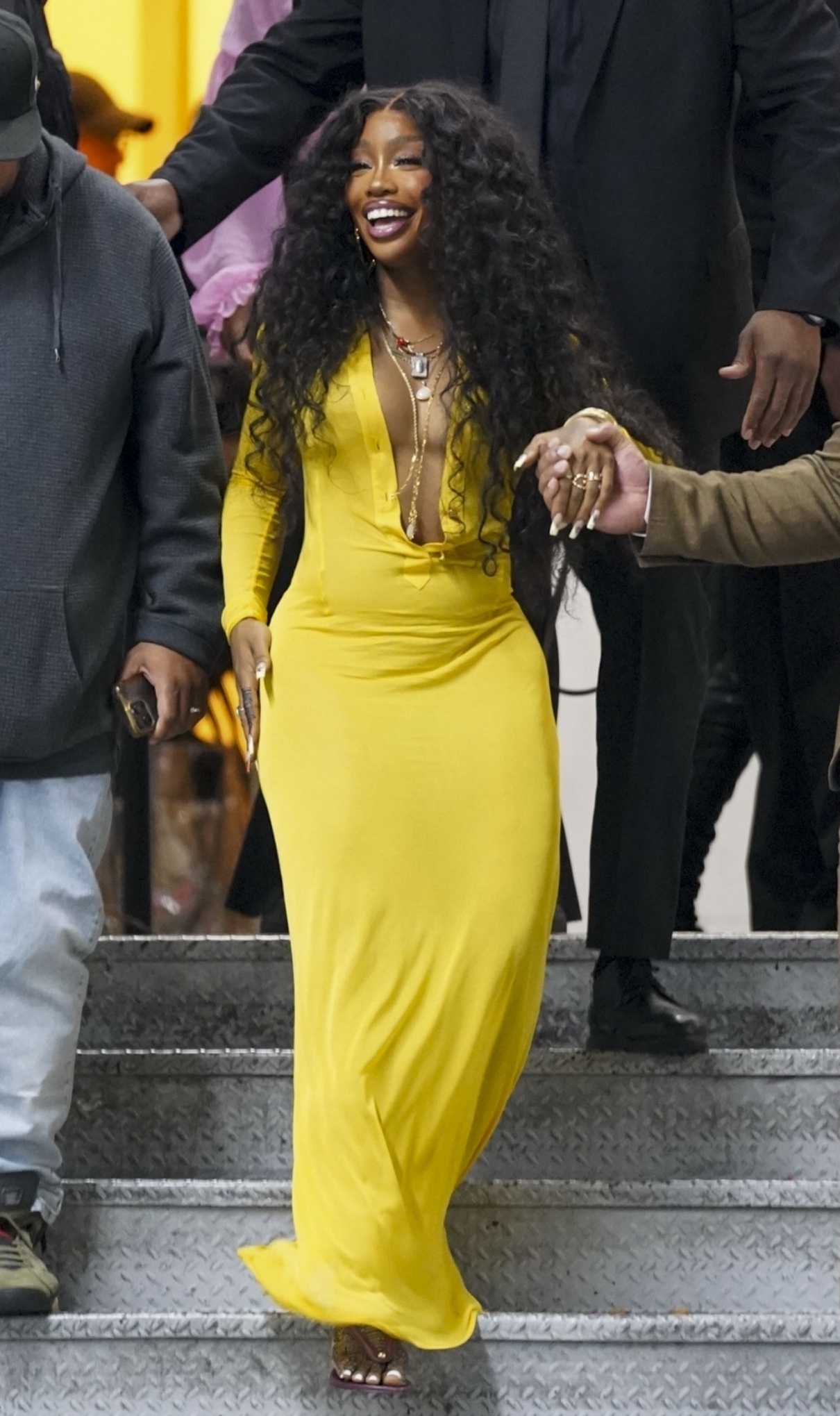 SZA in a Yellow Dress Leaves 2024 iHeartRadio Music Awards in Hollywood ...