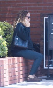 Ashley Tisdale in a Black Sweatshirt