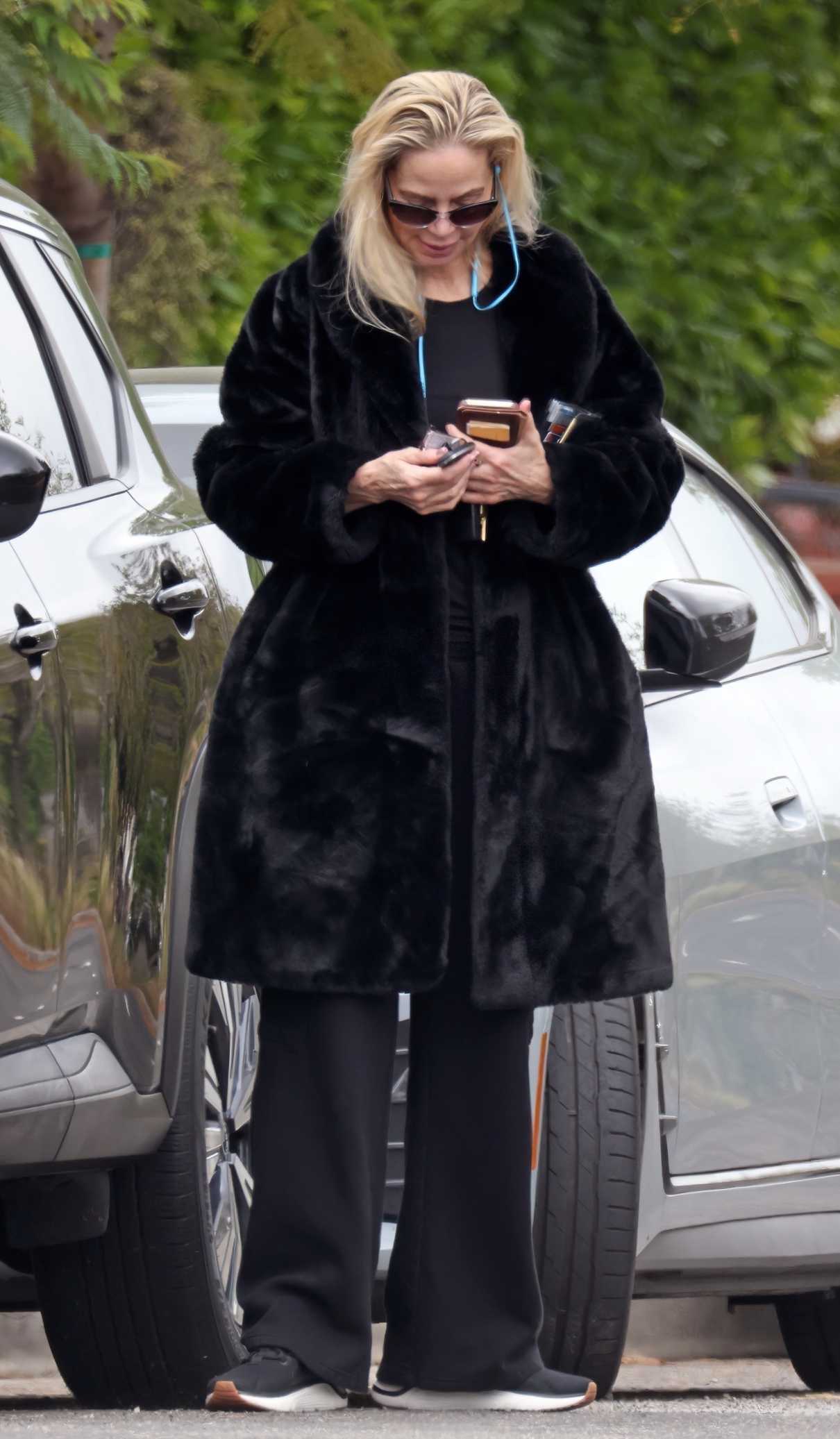 Christina Fulton in a Black Fur Coat