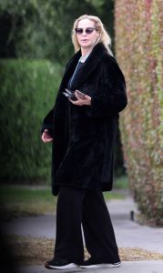 Christina Fulton in a Black Fur Coat