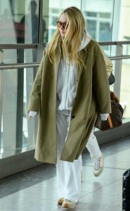 Dakota Fanning in an Olive Trench Coat