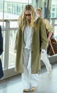 Dakota Fanning in an Olive Trench Coat