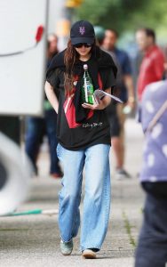 Dakota Johnson in a Black Rolling Stones Graphic Tee