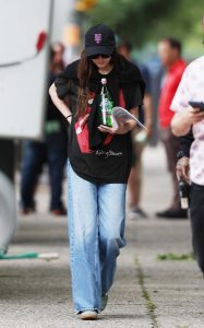 Dakota Johnson in a Black Rolling Stones Graphic Tee