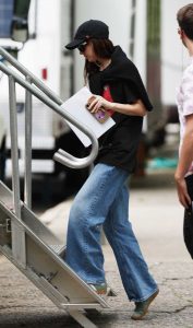 Dakota Johnson in a Black Rolling Stones Graphic Tee