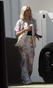 Erika Jayne in a Patterned White Pantsuit