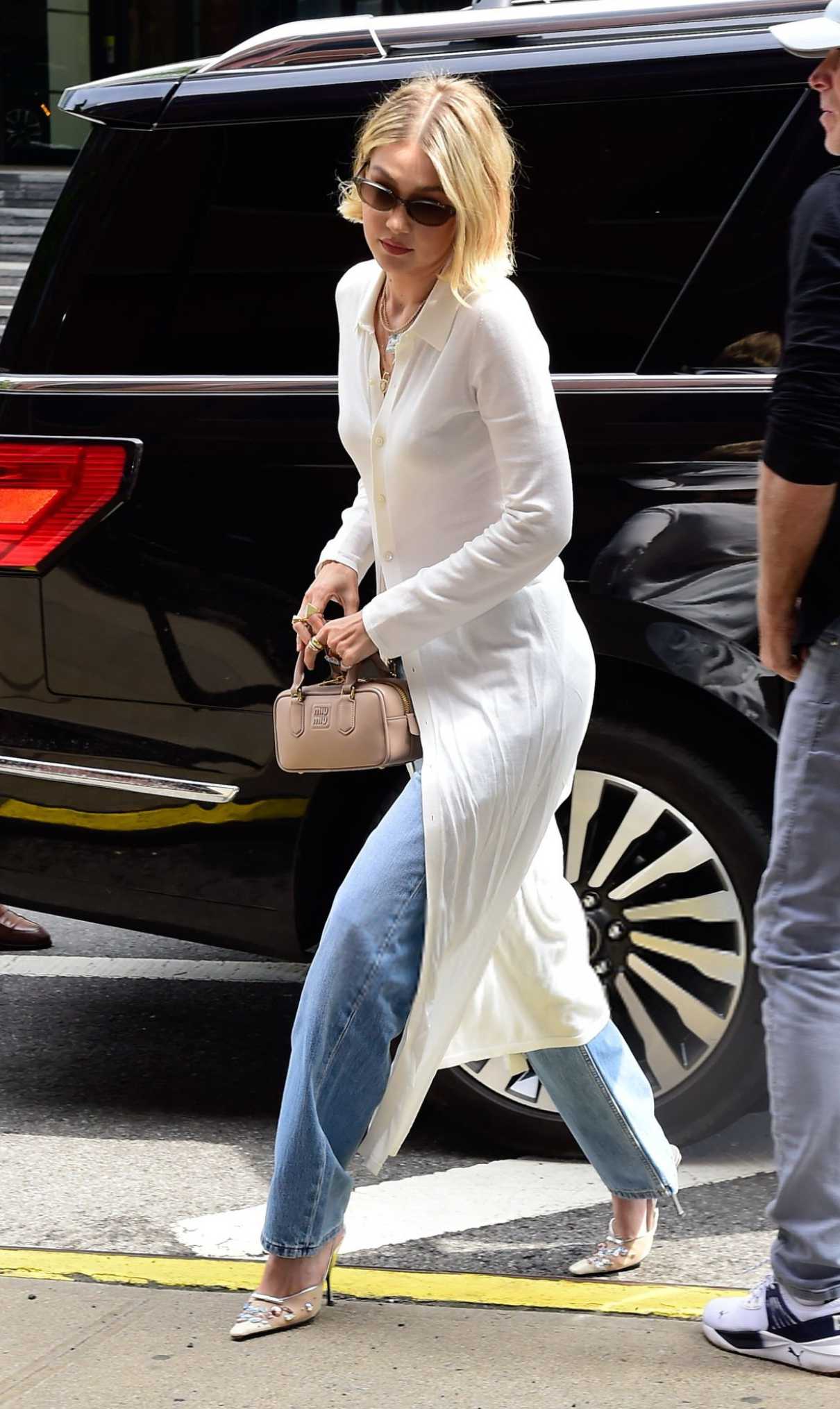 Gigi Hadid in a White Cardigan