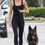 Gisele Bundchen in a Black Tank Top Walks Her Dog in Miami 04/30/2024