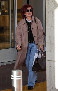 Sharon Osbourne in a Tan Trench Coat