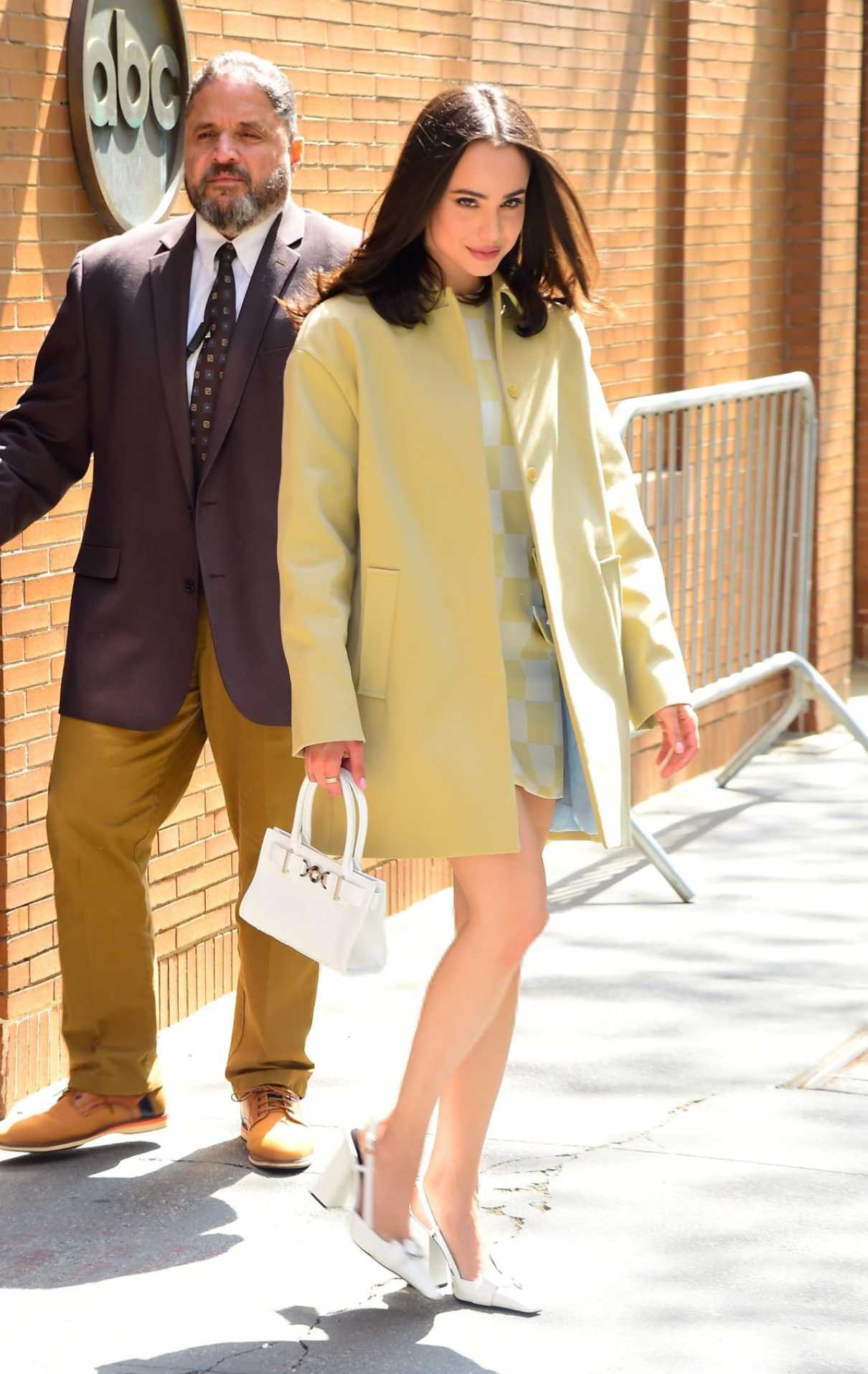 Sofia Carson in a Yellow Jacket