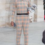 Venus Williams in a Black Cap Enjoying a Stroll with Her Tiny Dog in Paris 05/25/2024