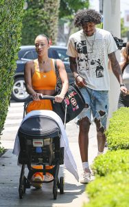 Draya Michele in an Orange Workout Ensemble