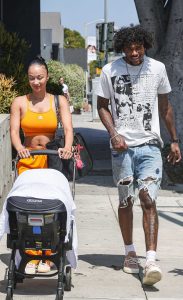 Draya Michele in an Orange Workout Ensemble