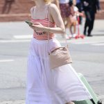 Elle Fanning in a White Skirt Was Seen Out in Soho in New York 06/04/2024