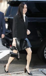 Jennifer Connelly in a Black Leather Mini Skirt