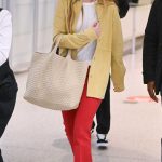 Jennifer Lawrence in a Red Pants Arrives at JFK Airport in New York 06/04/2024
