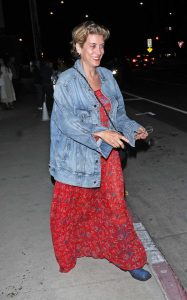 Kate Walsh in a Red Floral Dress