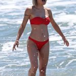 Michelle Hunziker in a Red Bikini at Alpemare Beach in Forte Dei Marmi 06/03/2024