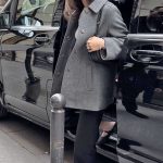 Olivia Rodrigo in a Grey Coat Arrives at a Thrift Shop in Paris 06/15/2024