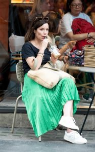 Anna Acton in a Green Skirt