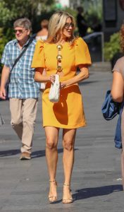 Ashley Roberts in an Orange Dress