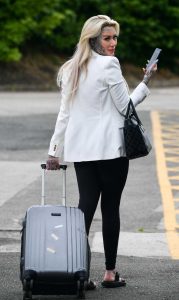 Becky Holt in a White Blazer