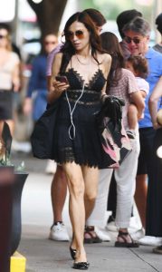 Famke Janssen in a Black Lace Mini Dress