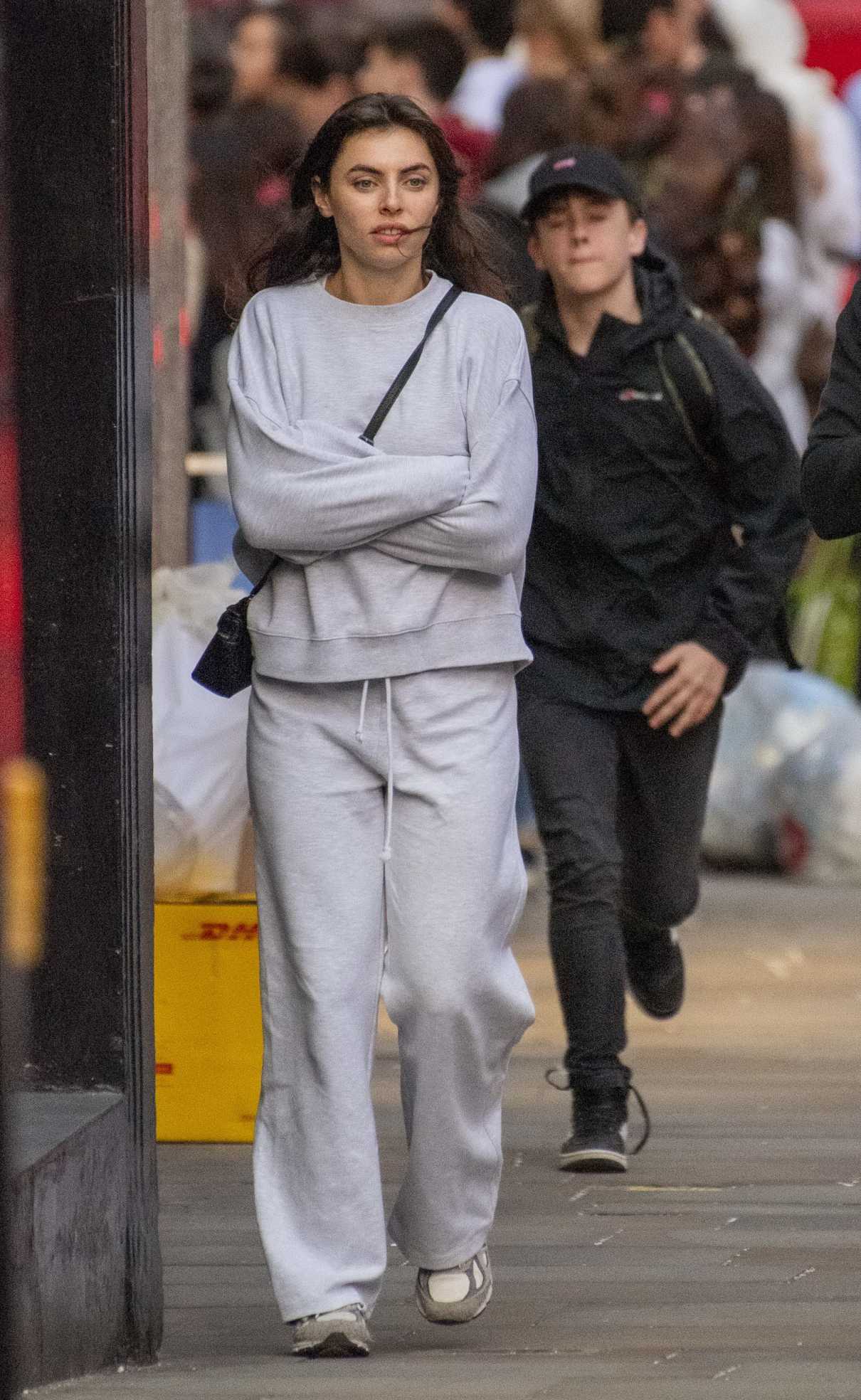 Francesca Allen in a Grey Sweatsuit