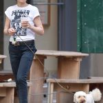 Julianna Margulies in a White Tee Walks Her Dog in New York 07/15/2024