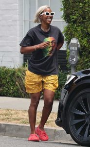 Kelly Rowland in a Yellow Shorts