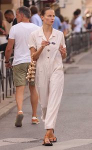 Natasha Poly in a Beige Jumpsuit