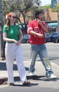 Olivia Macklin in a Green Tee