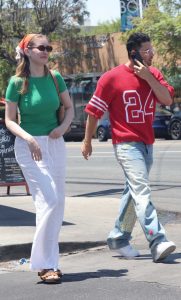 Olivia Macklin in a Green Tee