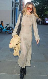 Rita Ora in a Beige See-Through Dress