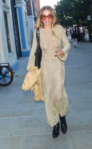 Rita Ora in a Beige See-Through Dress