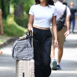 Shay Mitchell in a White Tee Arrives at the West Side Heliport in New York City 07/04/2024