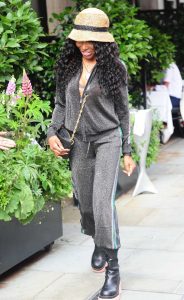 Sinitta in a Grey Sweatsuit