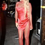 Carmen Electra in a Red Mini Dress Attends Katy Perry Event in West Hollywood 08/23/2024