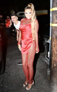 Carmen Electra in a Red Mini Dress